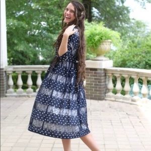 Dainty Jewell’s black polka dot midi dress